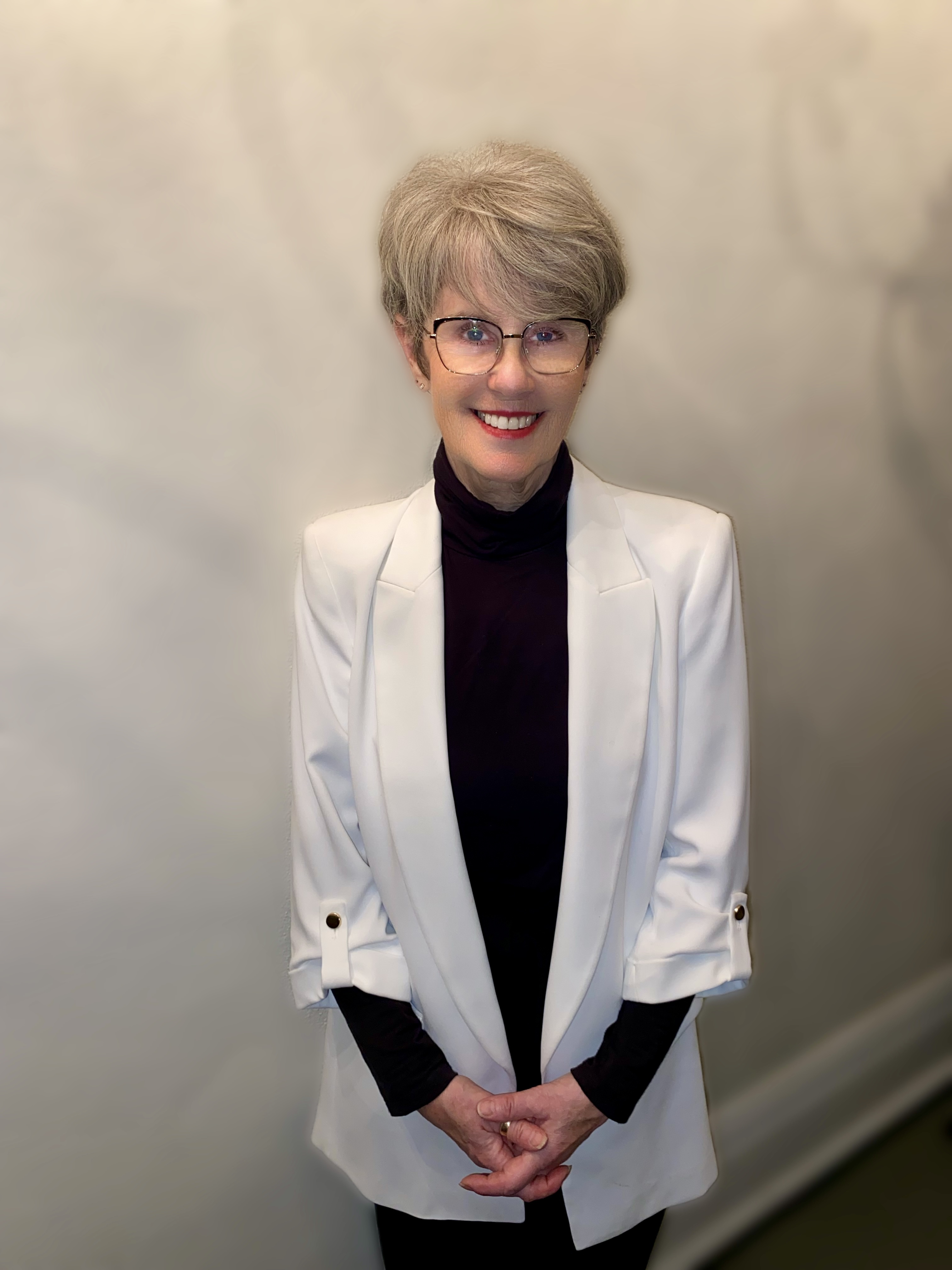 Headshot of Kim, The Heart of Operations for Open Road Systems.